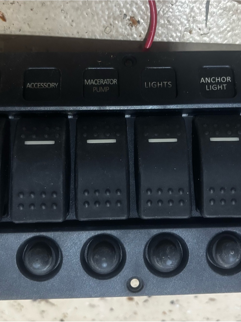 Black Marine Switch Panel with Multiple Rocker Switches